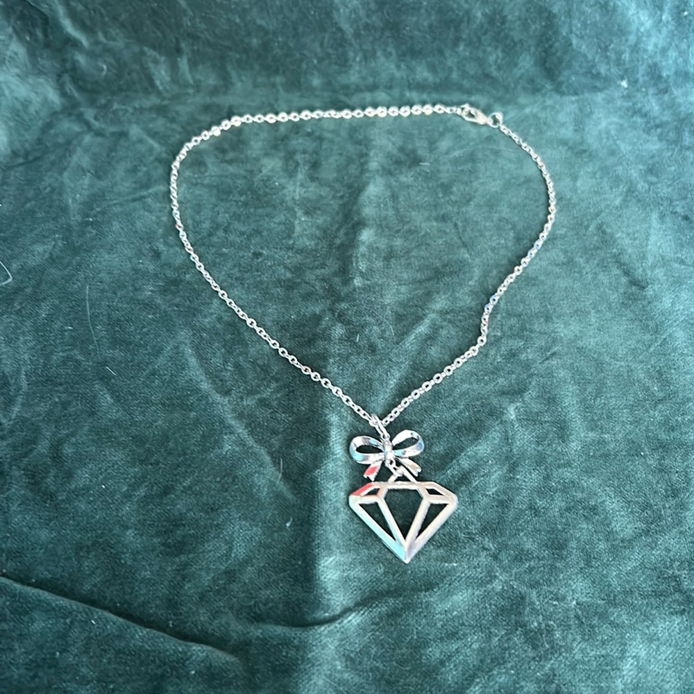 Silver  Necklace with Diamond shape and Bow Charms.